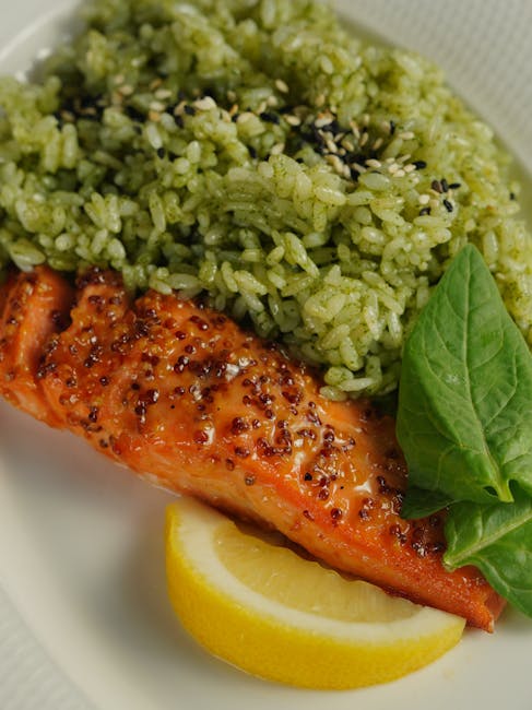 Grilled salmon with green pesto rice and lemon